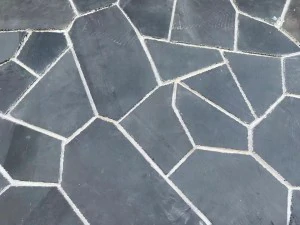 Black irregular landscaping stones.